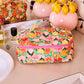 Popping Flowers Peach Quilted Toiletry Case