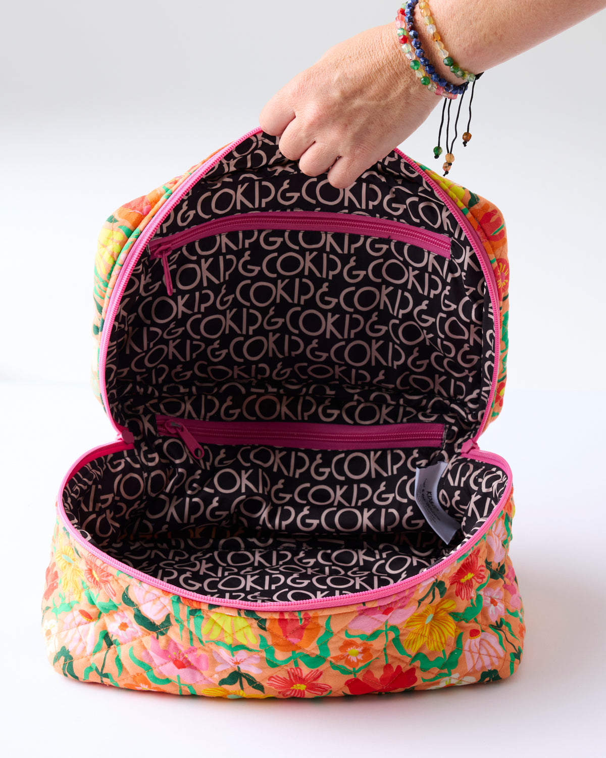 Popping Flowers Peach Quilted Toiletry Case